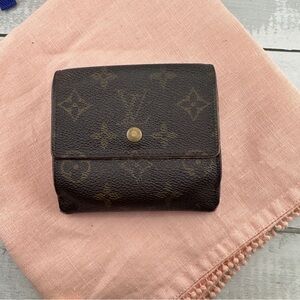 AUTHENTIC Louis Vuitton vintage Monogram Elise canvas wallet.